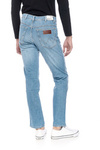 Męskie spodnie jeansowe zwężane WRANGLER TEXAS SLIM LIGHT STRIKE W12SQ148S